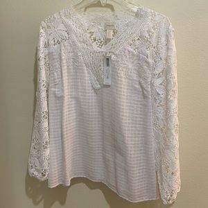 Chico’s size 2P (L/12) long sleeved patterned and lace top. Brand new!